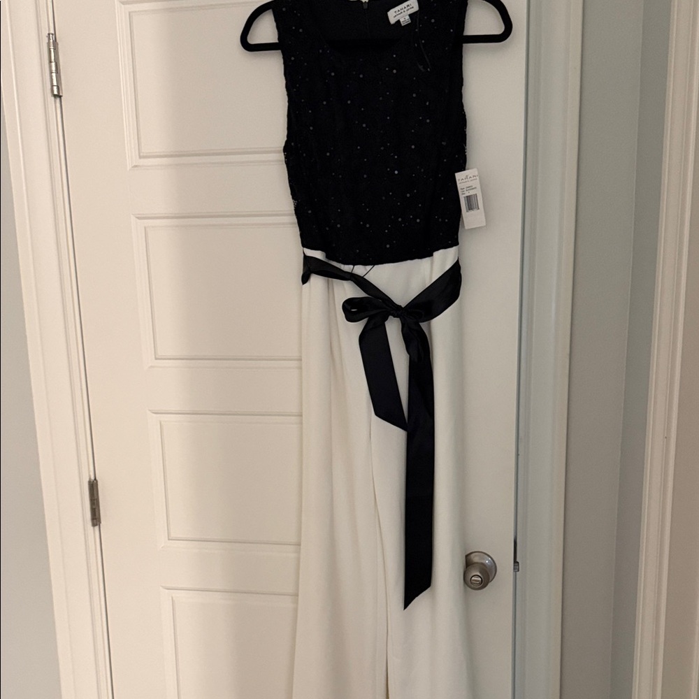 NWT Tahari size 4 women’s Elegant Black lace w sequin and White belted Jumpsuit